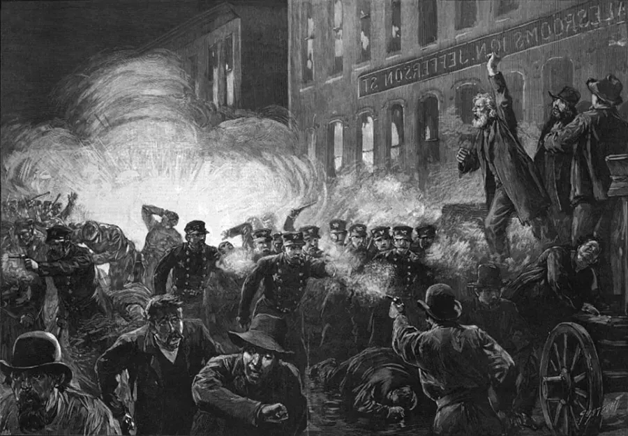 A historical illustration of the Haymarket Riots in black and white featuring workers protesting in front of a building and smoke